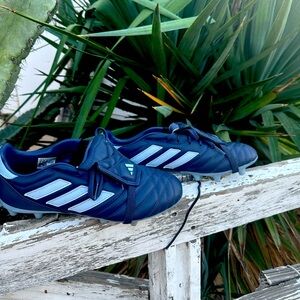 Adidas soccer shoes.